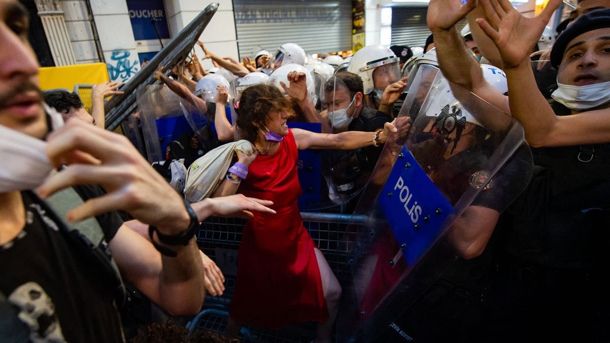 Women demonstrators clash with Turkish police as they protest against Turkey's decision to withdraw from the Istanbul Convention, in Istanbul. Credit: AFP Photo