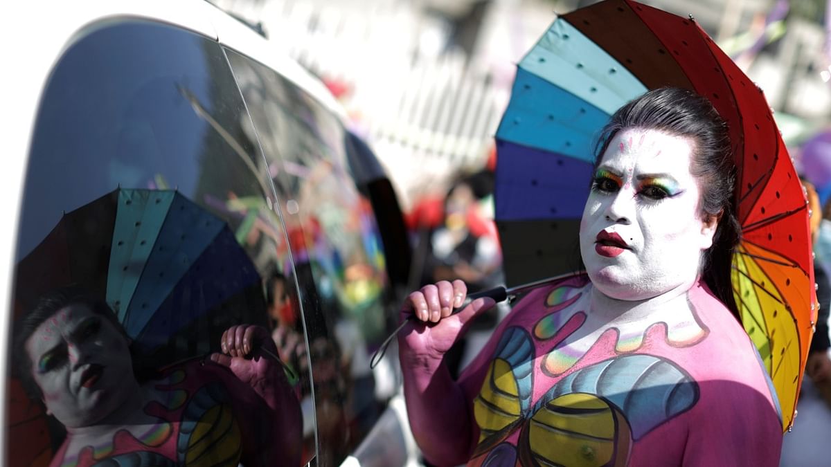 A participant poses for a picture during the