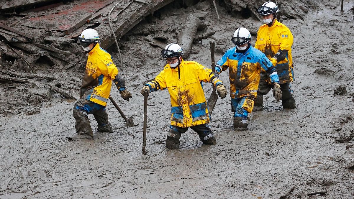 Rescuers conduct a search operation at the site of a mudslide at Izusan in Atami, Shizuoka prefecture, southwest of Tokyo. Credit: AP/PTI Photo