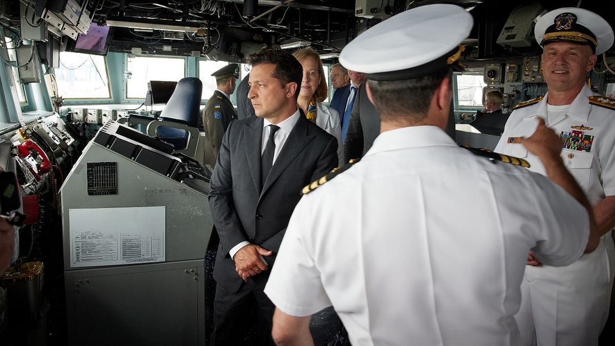Ukrainian President Volodymyr Zelenskiy meets the crew members as he tours US missile destroyer USS Ross, which is involved in the Sea Breeze 2021 military drills, in the Black Sea port of Odessa, Ukraine.