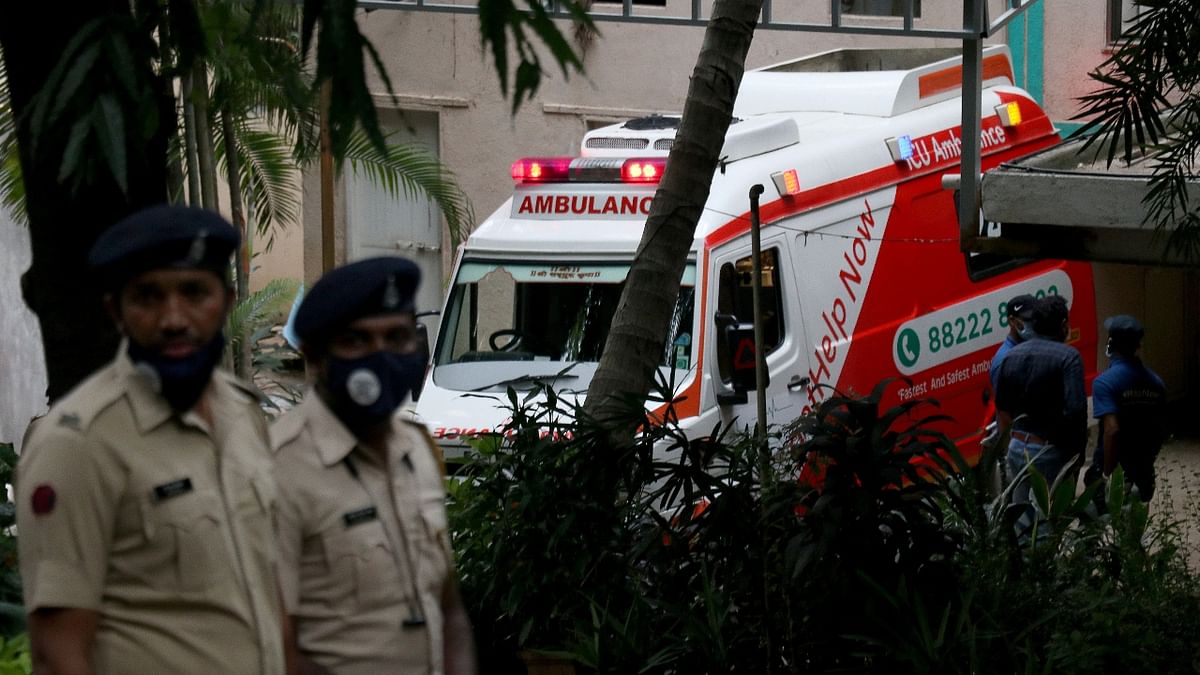 An ambulance that carried the mortal remains of legendary actor Dilip Kumar is seen parked outside the actor's house in Mumbai. Credit: AFP Photo