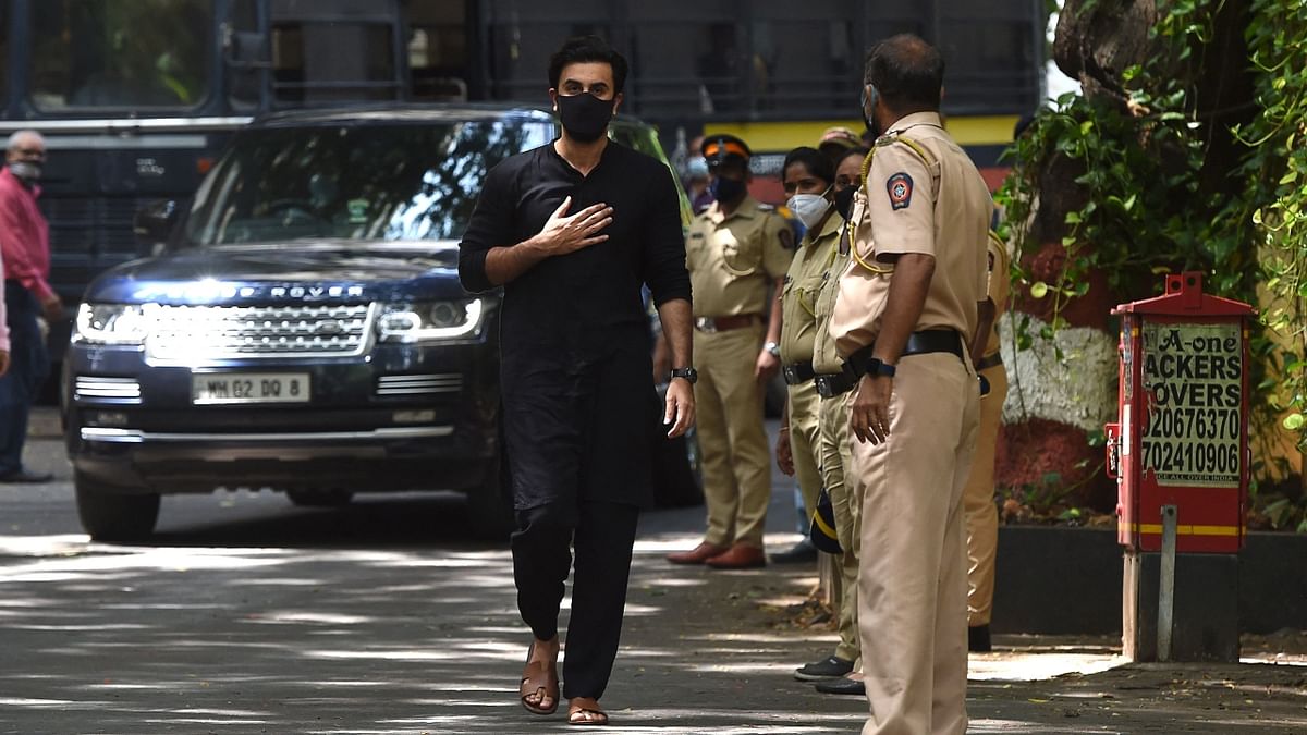 Ranbir Kapoor gestures as he arrives to pay his last respects. Credit: AFP Photo