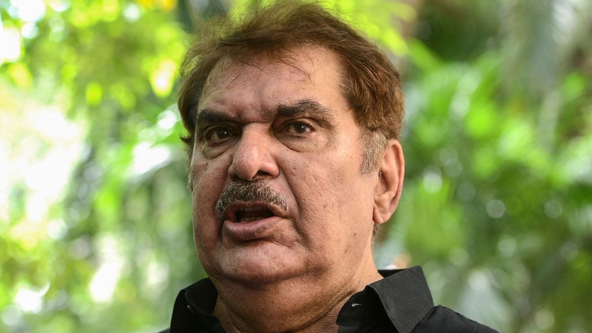 Raza Murad gets clicked on his arrival. Credit: AFP Photo