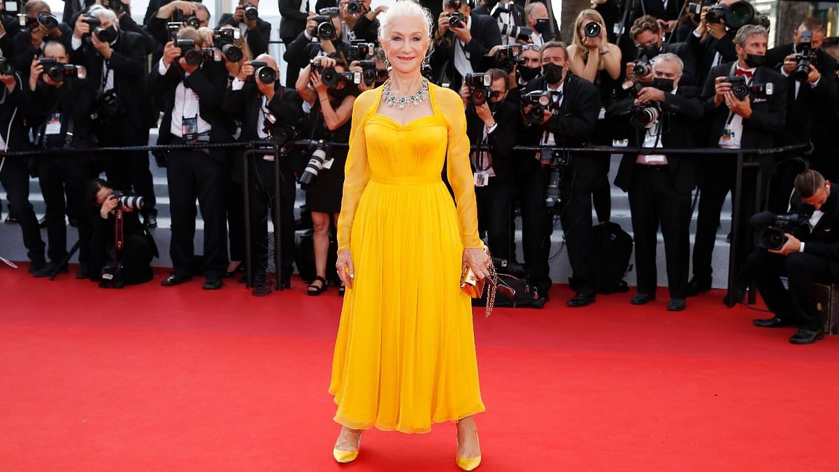 Helen Mirren wowed all in a warm yellow dress by Dolce & Gabbana. Credit: Reuters Photo