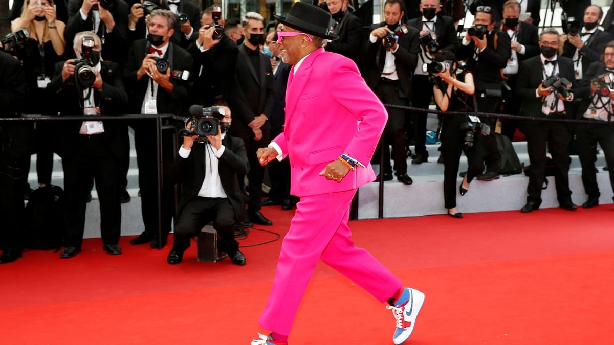 US director Spike Lee wore a hot pink suit for the opening ceremony. Credit: Reuters Photo