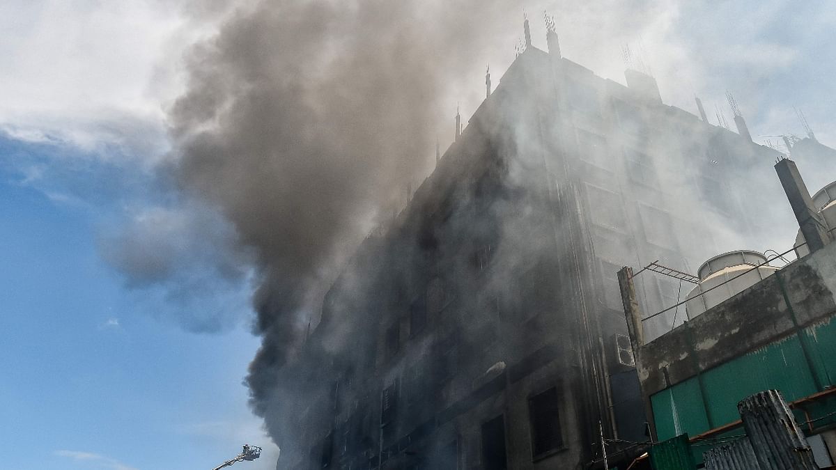 Several workers jumped off the building to escape the devastating fire. Credit: AFP Photo