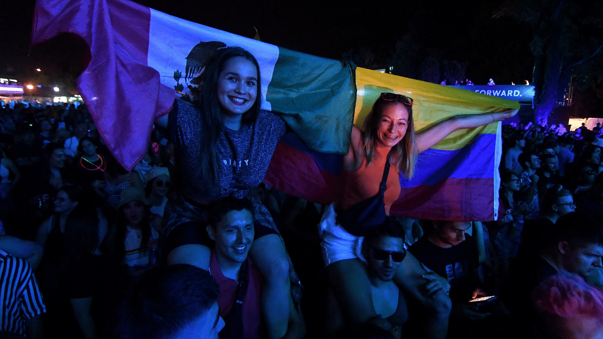 Festival goers cheer in front of the main stage at the EXIT festival in the Serbian city of Novi Sad. Credit: AFP Photo