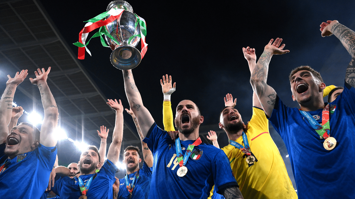 Italy's Leonardo Bonucci celebrates with the trophy after winning Euro 2020. Credit: Reuters Photo
