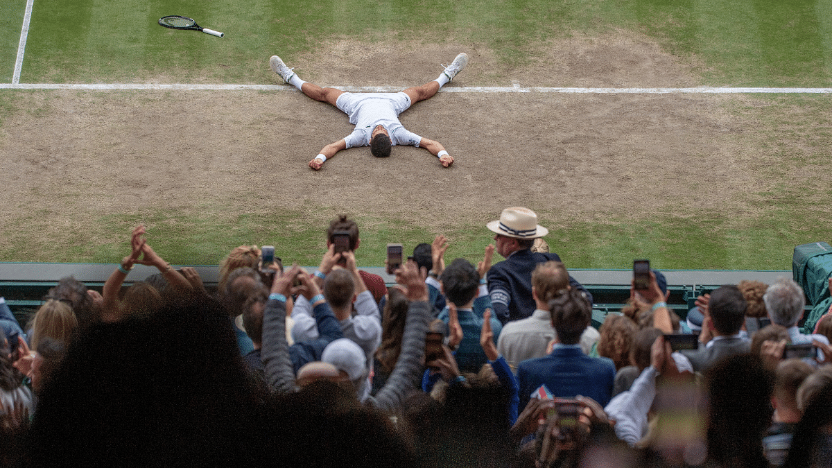 Serbia's Novak Djokovic celebrates after winning his final match against Italy's Matteo Berrettini. Credit: Reuters Photo