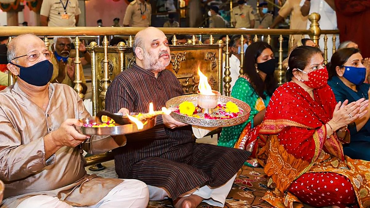 Union Home Minister Amit Shah visited the temple and performed aarti before kicking off the Rath Yatra. Credit: Twitter/@AmitShah