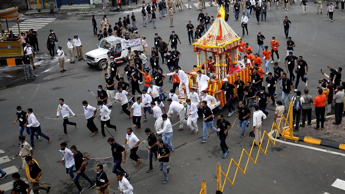 The 144th annual rath yatra of Lord Jagannath was held without the usual festive spirit and crowds and culminated in four hours, instead of the usual 12 hours, amid heavy security as the general public was not allowed to participate in it in view of the Covid-19 pandemic. Credit: PTI Photo