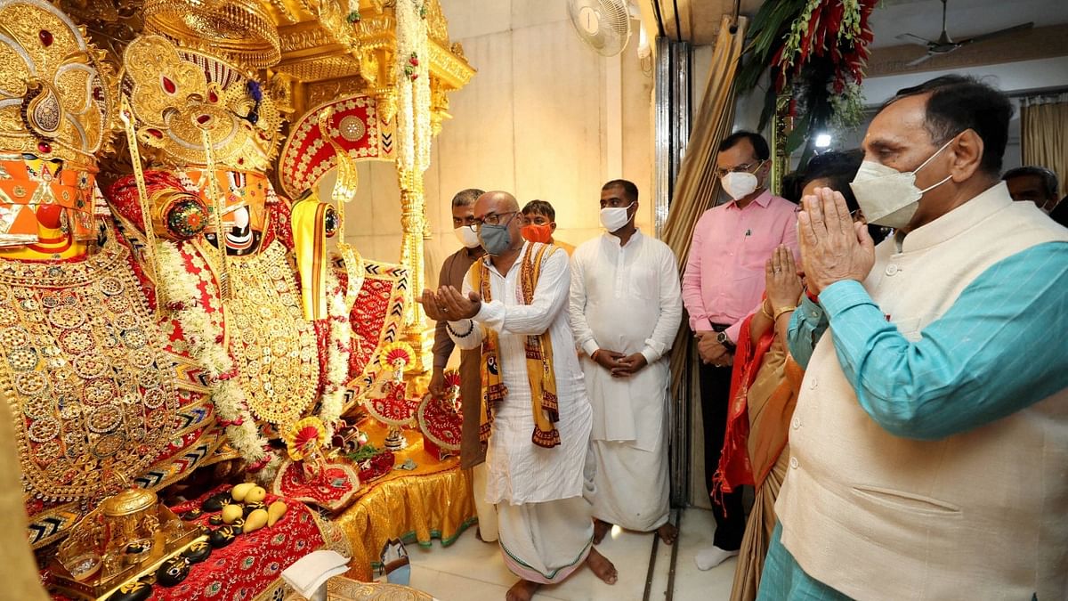 Gujarat CM Vijay Rupani offers prayers at Jagannath Temple on the eve of the annual Rath Yatra festival, in Ahmedabad. Credit: PTI Photo