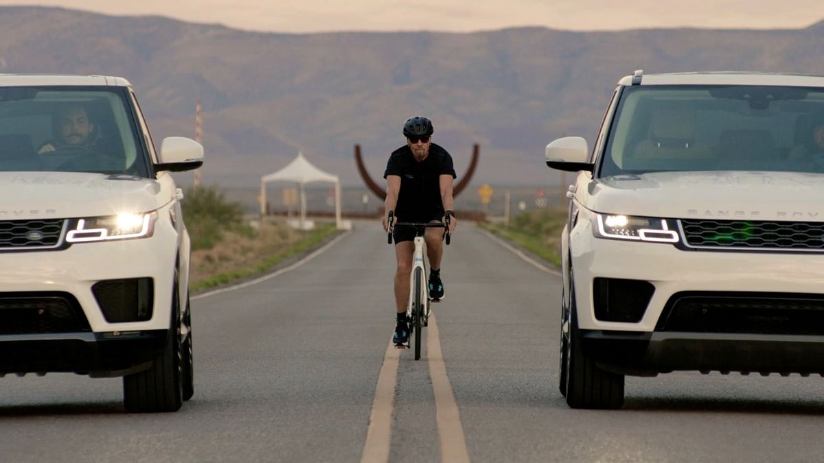 Billionaire Branson rides a bicycle to space flight launch site; See Pics