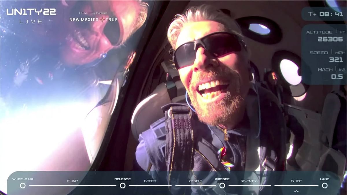 Virgin Galactic's Richard Branson touches edge of space in historic first flight - see pics
