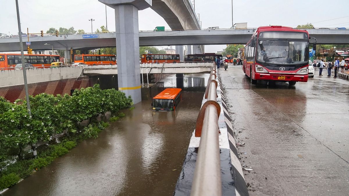 A photo of a submerged DTC bus after heavy rain in New Delhi.