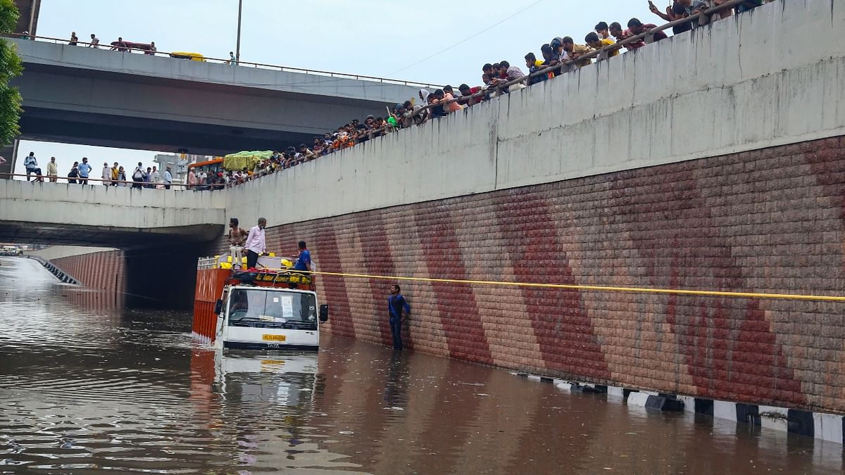 A truck stranded in flooded underpass in Delhi.