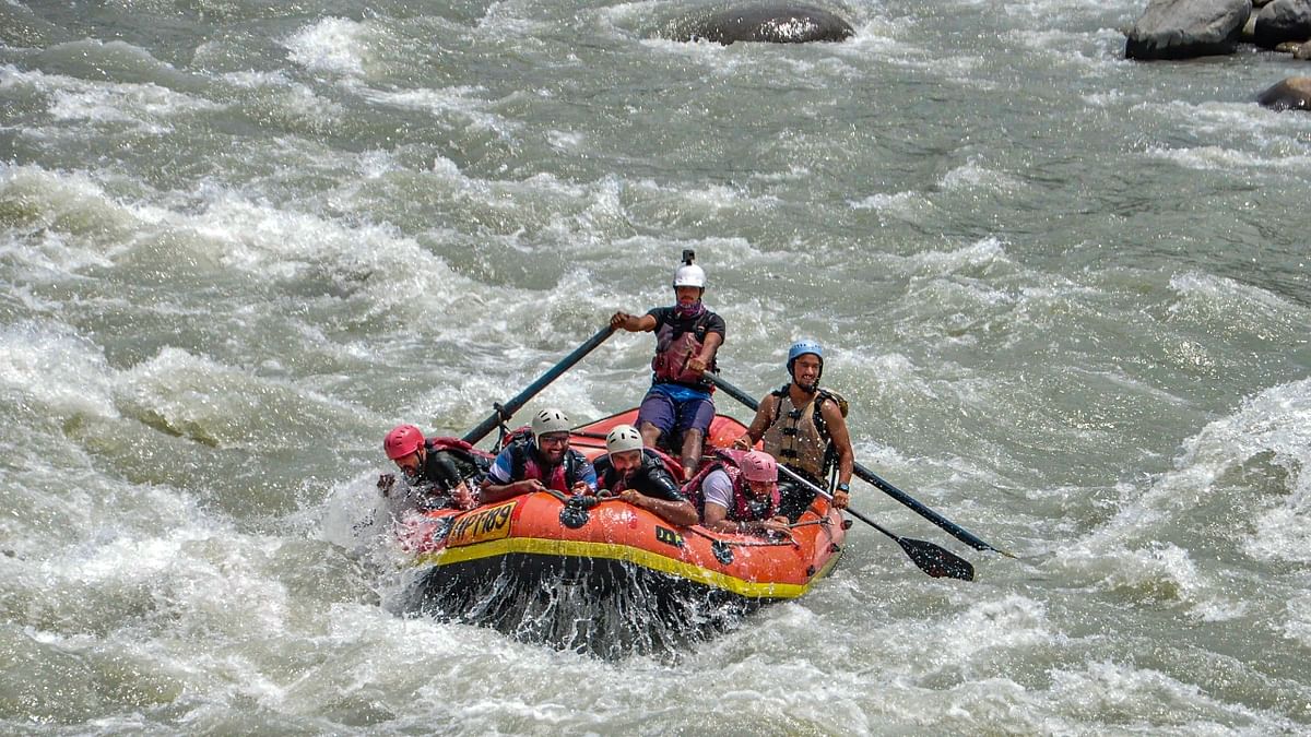 Nature lovers are seen enjoying river rafting in Manali. Credit: PTI Photo