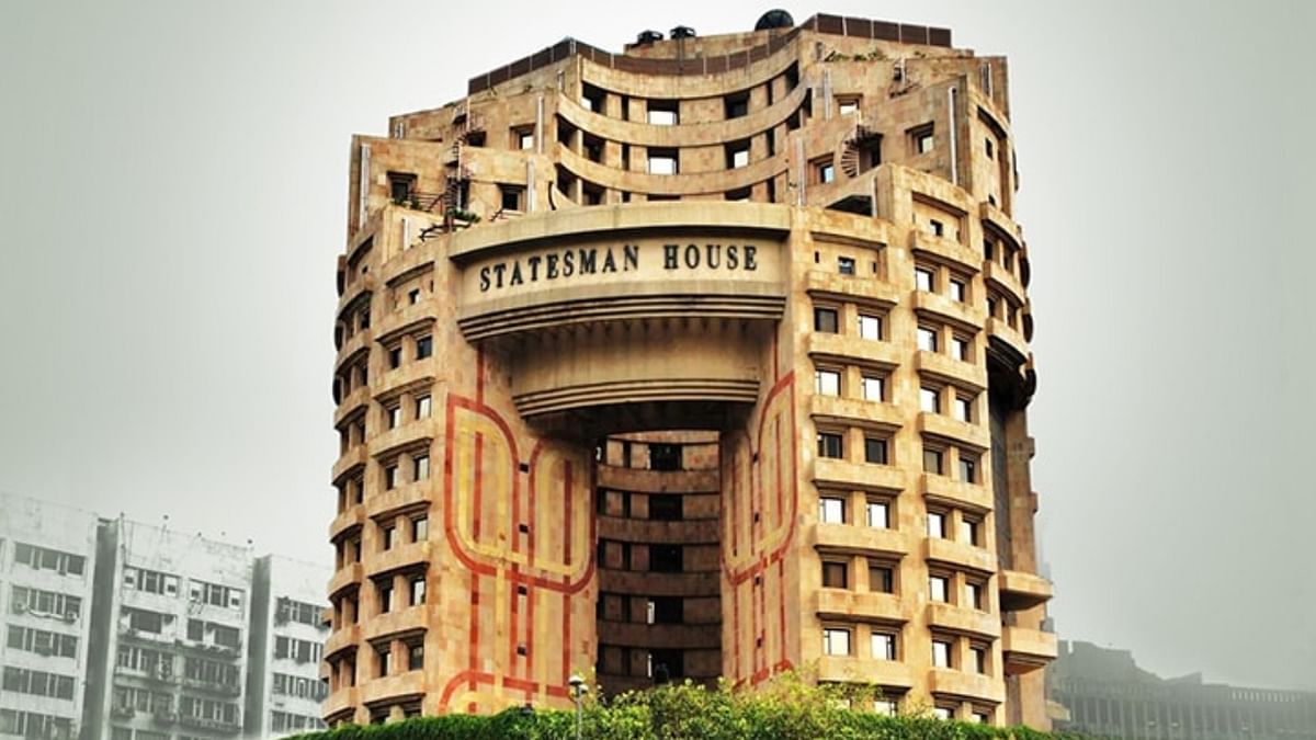 Statesman House, New Delhi: Situated in the heart of Delhi, the Statesman House is one of the tallest buildings in Connaught Place. This traditional-looking architectural marvel has a hollow cylinder-like shape that is diagonally cut from above. Credit: Avanta