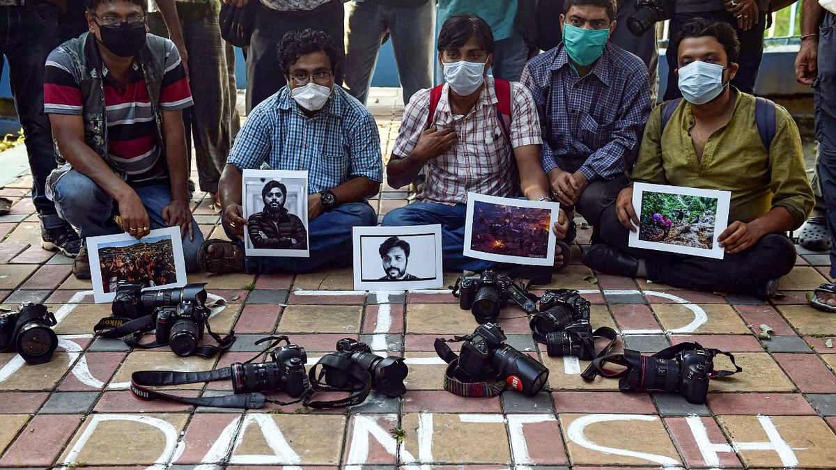 Photographers pay tribute to Pulitzer prize-winning photographer Danish Siddiqui, who was killed in Afghanistan, while covering a clash between Afghan security forces and Taliban fighters, in Kolkata. Credit: pTI Photo
