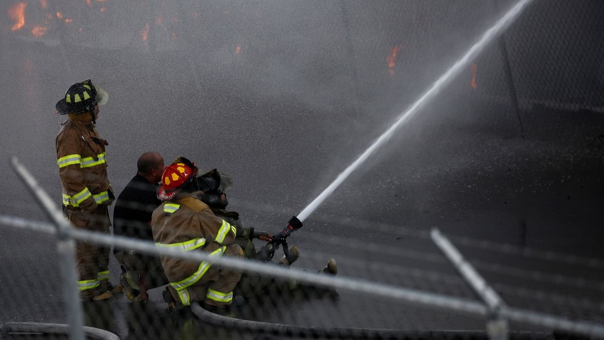 Firefighters try to extinguish a fire at the Canadian BRP factory, dedicated to making off-road vehicles, in Ciudad Juarez, Mexico. Credit: Reuters Photo