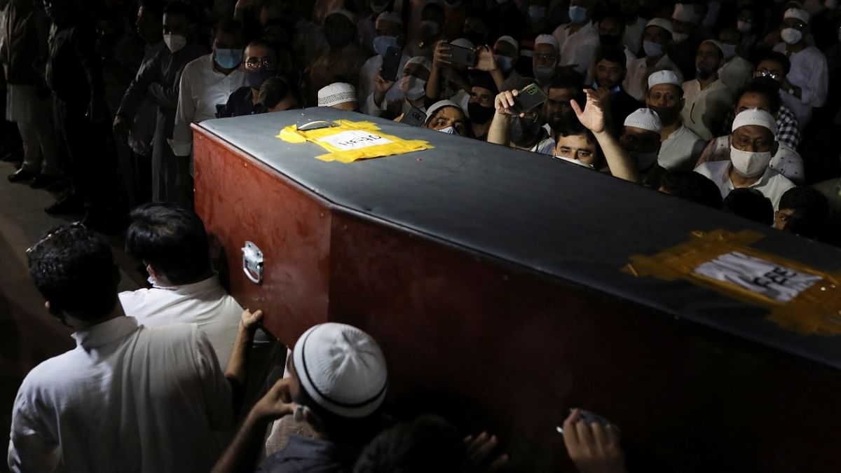 People carry the coffin of Reuters journalist Danish Siddiqui inside the premises of Jamia Millia Islamia university in New Delhi. Credit: Reuters Photo