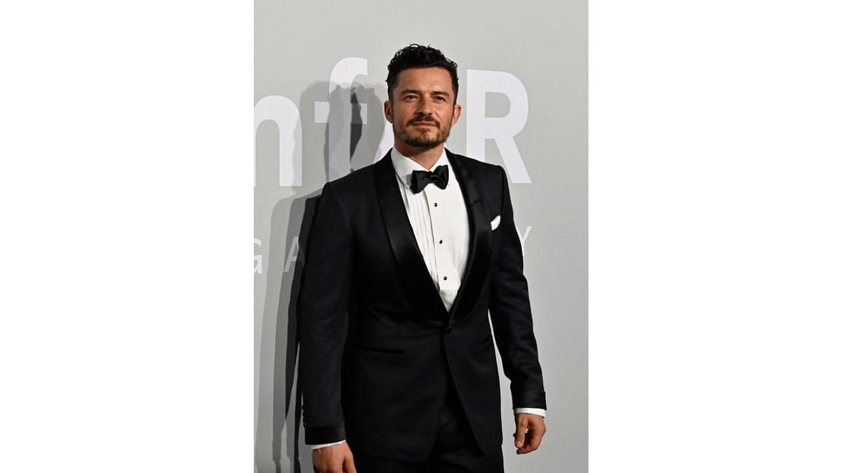 Orlando Bloom looked dapper in a basic black tuxedo.  Credit: AFP Photo