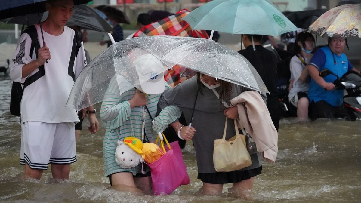 Lakhs of people were evacuated in China’s central Henan province after it was hit by the heaviest rainfall in years. President Xi Jinping deployed the Army to rescue those trapped in inundated subways, hotels and public places, amid fears of the collapse of a dam posing flood risk to the provincial capital. Credit: Reuters Photo
