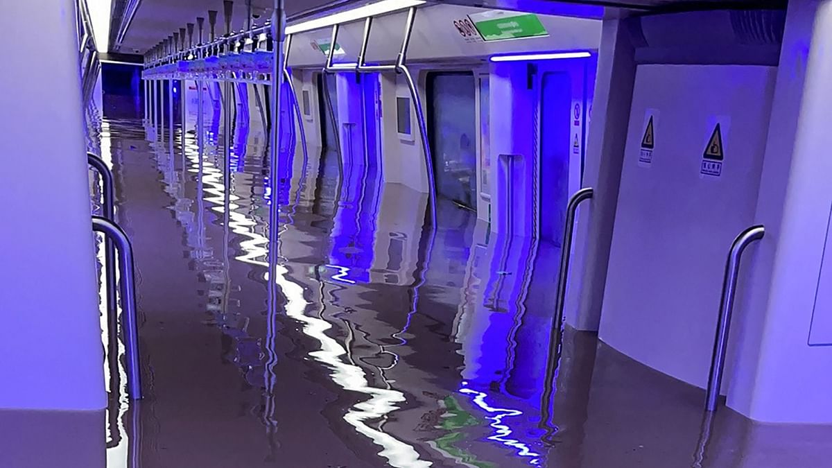 Visuals show flooded metro trains in central China amid heavy rainfall. Credit: AFP Photo