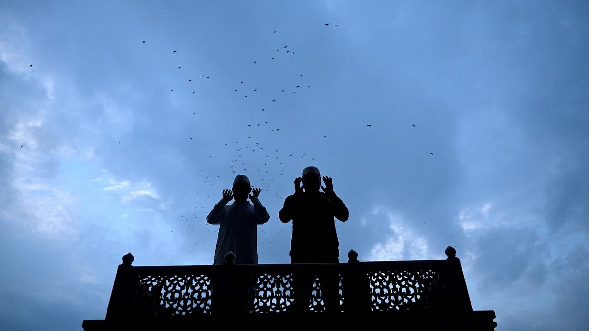 Muslims offer special morning prayers during the Eid al-Adha festival at the Jama Masjid in New Delhi. Credit: AFP Photo