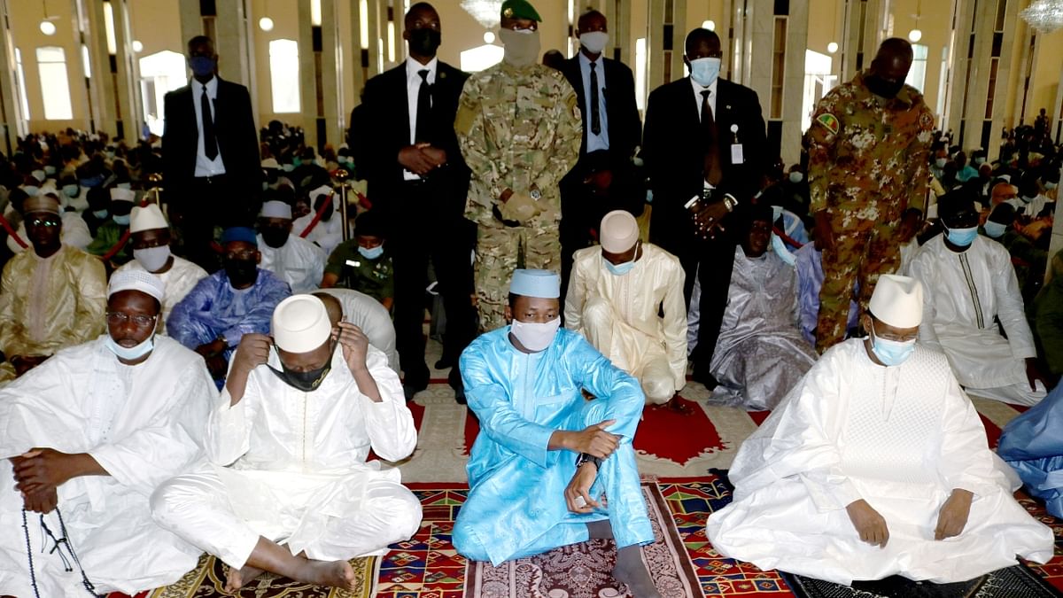 The festival is celebrated in remembrance of Abraham's readiness to sacrifice his son to God. Mali's interim president Colonel Assimi Goita, leader of two military coups, attends the Eid Al Adha prayer at a mosque in Bamako, Mali. Credit: Reuters Photo