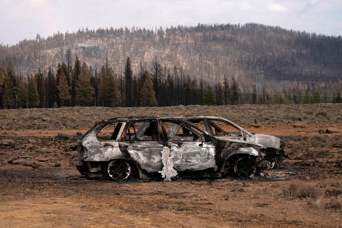 The remnants of cars destroyed by the Bootleg Fire are seen in a small community near Beatty, Oregon, US. Credit: Reuters Photo