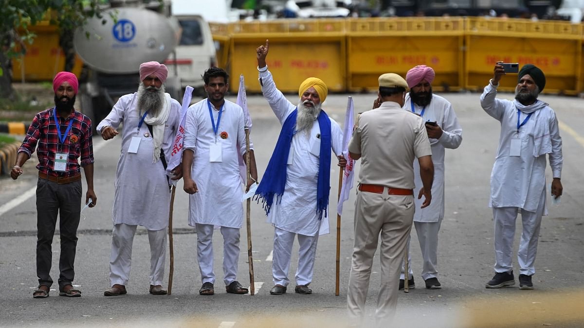 The Samyukt Kisan Morcha (SKM), an umbrella body of farmer unions spearheading the protest against the three farm laws, has been asked to give an undertaking that all COVID-19 norms would be followed and the stir would be peaceful. Credit: AFP Photo