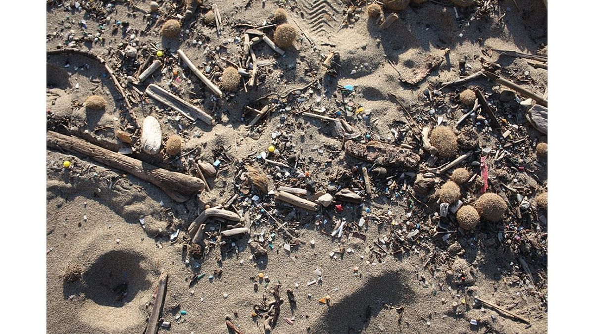 In Tuscany, near San Vincenzo, Italy, small pieces of broken-down plastic and industrial plastic pellets have been washed up on the beach along the coastline. Photo by Alexandra Rudiak (Germany/Canada)