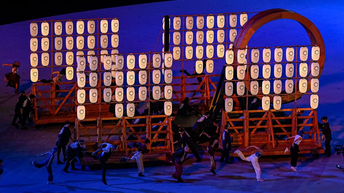 Artists perform at the Olympics Stadium, during the opening ceremony of the Summer Olympics 2020, in Tokyo. Credit: PTI Photo