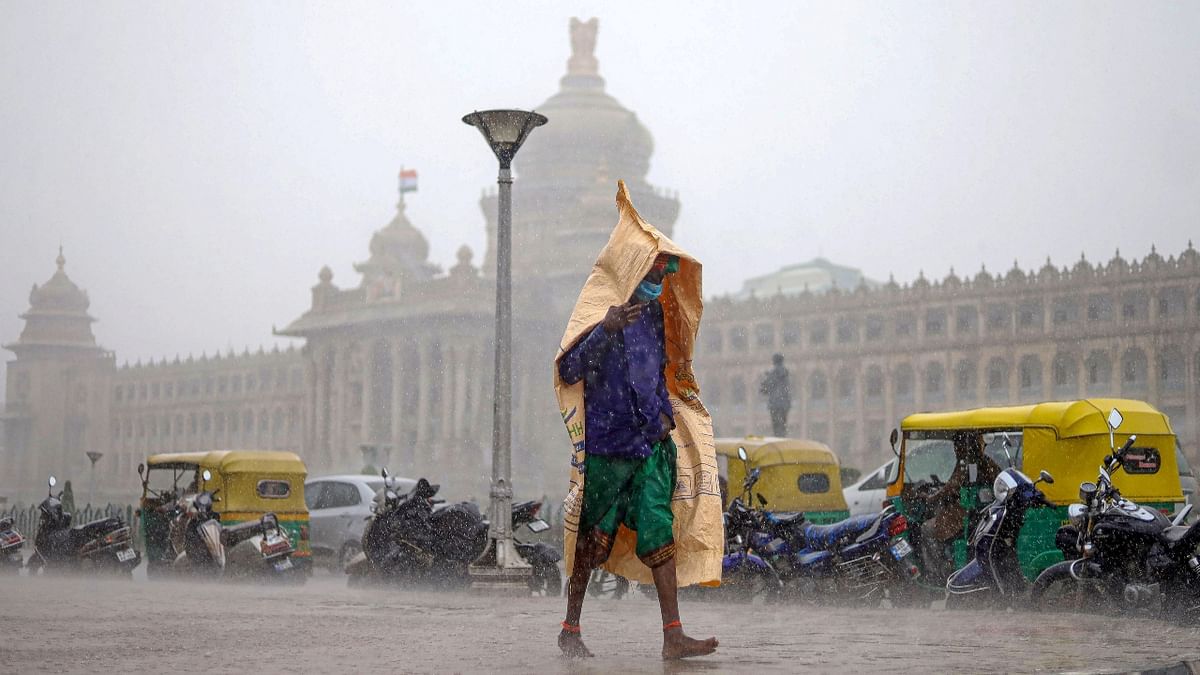 The intermittent rain from morning turned into a downpour in the afternoon. Credit: PTI Photo