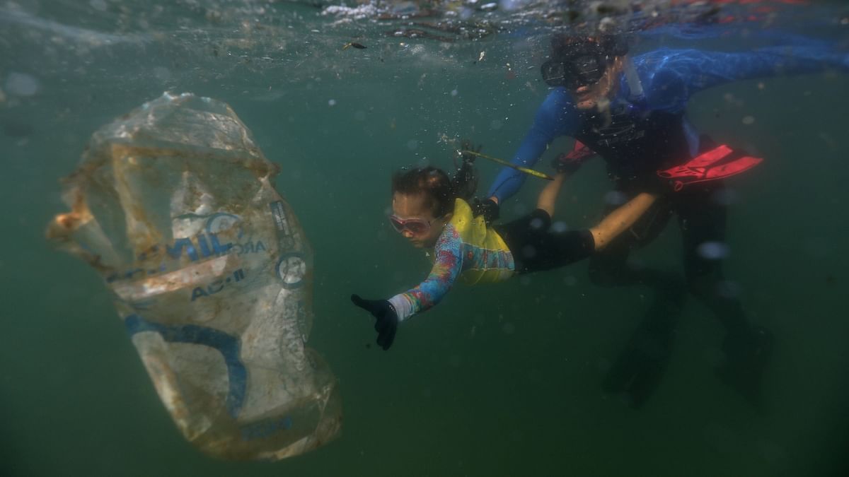 Gomes, who made a film in 2017 about the underwater world of Guanabara Bay, was inspired by the birth of his daughter to start Instituto Mar Urbano, a Rio-based group dedicated to fighting marine disasters. Credit: Reuters Photo