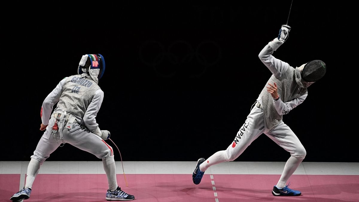 Takahiro Shikine compete against Daniele Garozzo in the men’s individual foil semi-final bout. Credit: AFP Photo