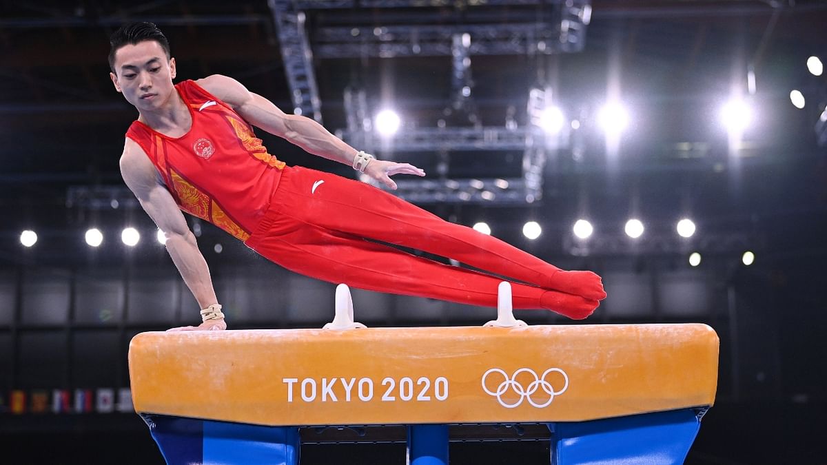 Zou Jingyuan of China in action on the pommel horse. Credit: Reuters Photo