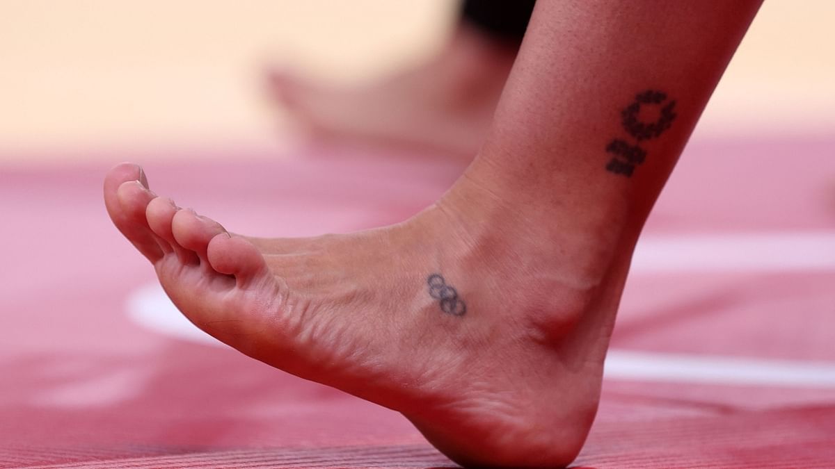 A Olympic rings tattoo is pictured on a judoka's foot. Credit: Reuters Photo