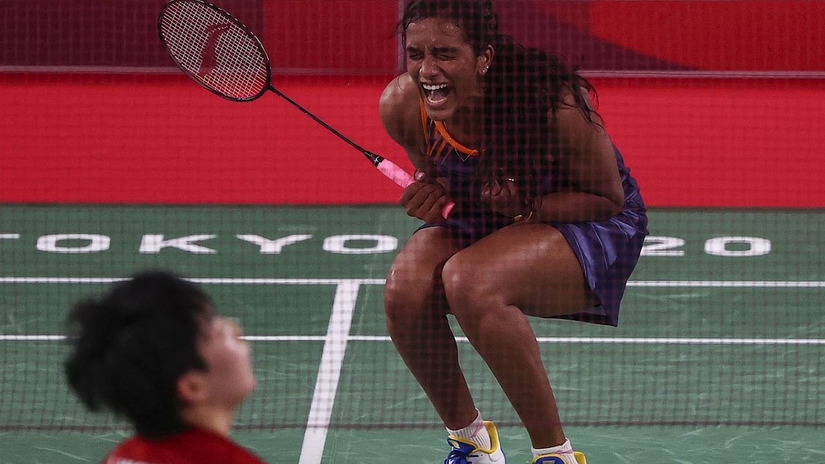 Reigning world champion PV Sindhu kept alive India's hopes of a first-ever Olympic gold in badminton by reaching the semifinals of the women's singles with a straight-game win over world No.5 Japanese Akane Yamaguchi. Credit: Reuters Photo