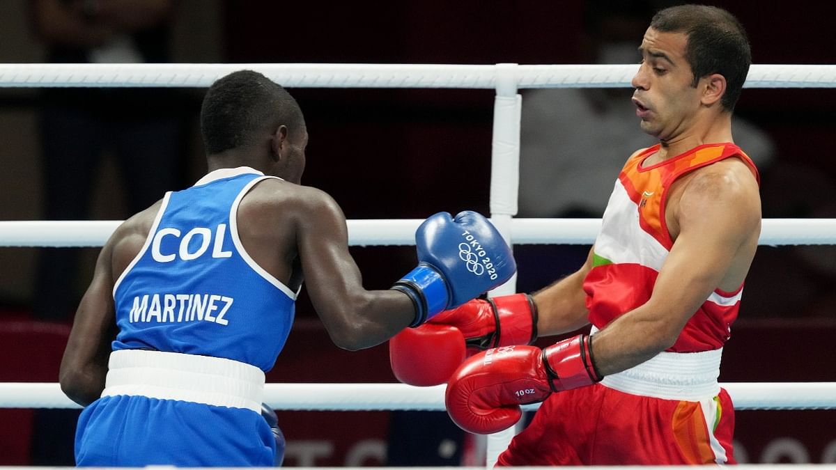 One of India's strongest medal contenders, Panghal was put under pressure by the sprightly Colombian in the opening round itself but the pre-bout favourite ensured that he connected better to claim the first three minutes 4-1. Credit: PTI Photo