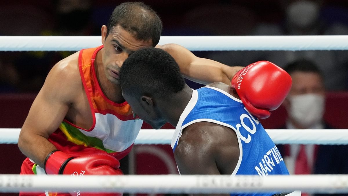 In Pics | World No.1 boxer Amit Panghal ousted from Tokyo Olympics, loses to Colombian Martinez