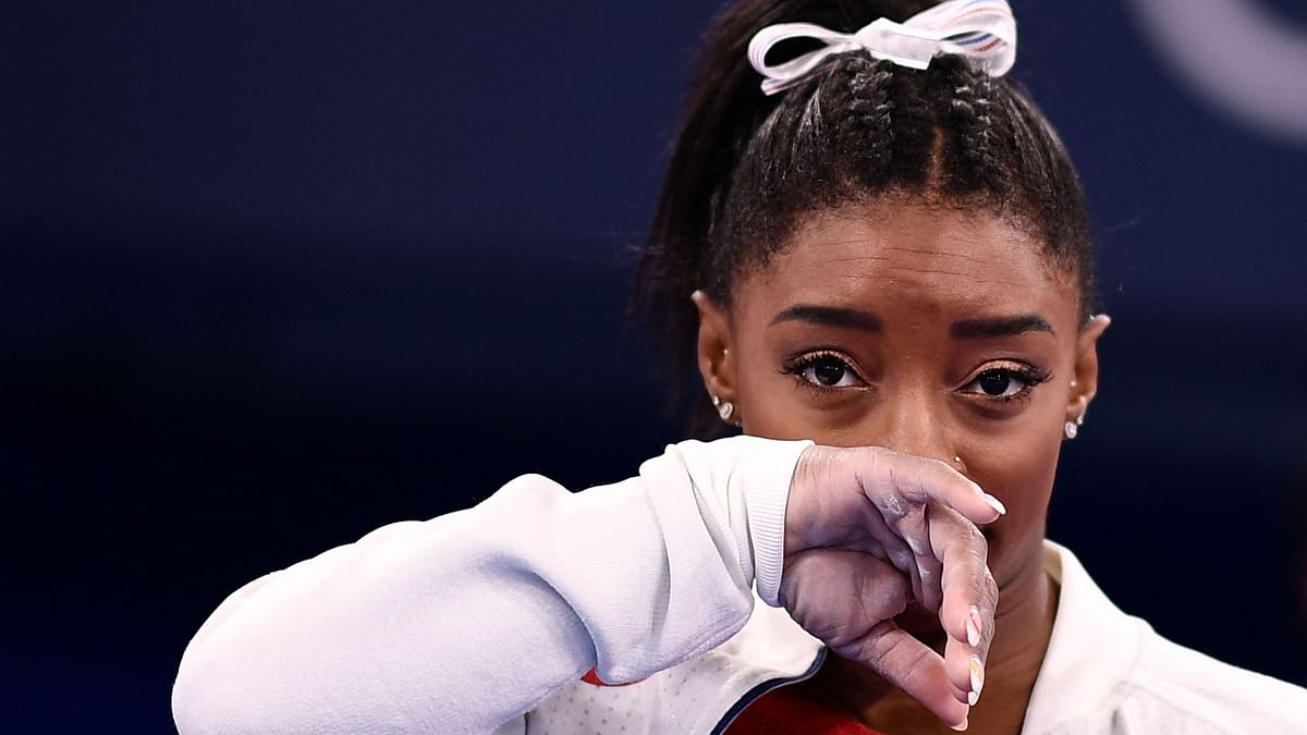 Simone Biles completed one vault at the start of the women's team final before abruptly withdrawing, citing mental health concerns. She also withdrew from the all-around, the vault and uneven bar finals. Credit: Reuters Photo