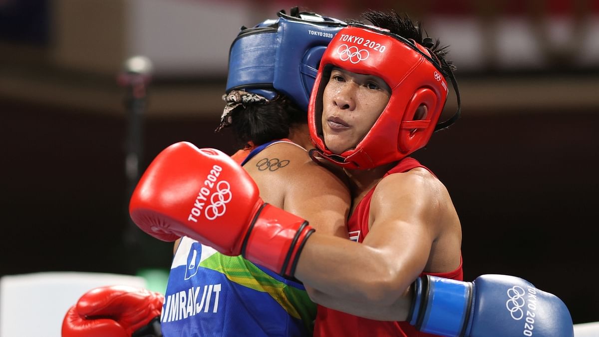 Simranjit Kaur and Sudaporn Seesondee in action during their women's lightweight (57-60 kg) preliminaries round of 16 boxing match during the Tokyo 2020 Olympic Games. Credit: AFP Photo