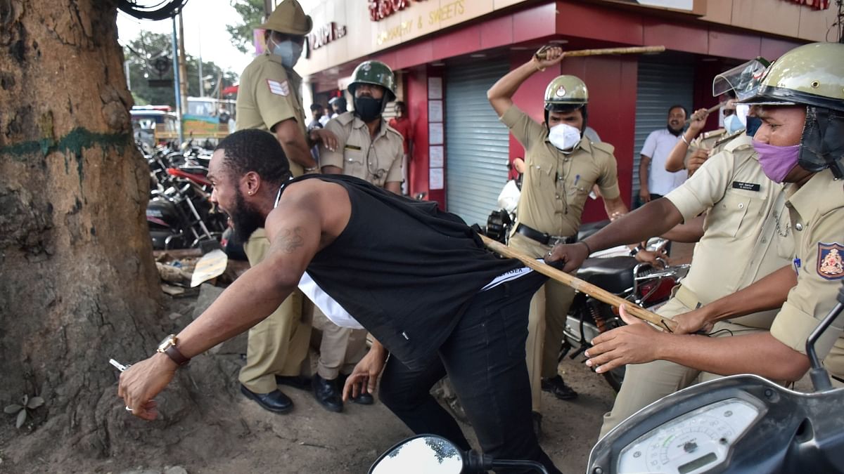 Police used batons to push back the protesters. Credit: PTI Photo