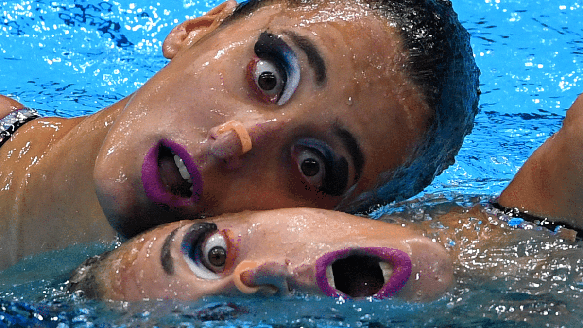 Anna Maria Alexandri of Austria and Eirini Alexandri of Austria during their performance of artistic swimming in Tokyo 2020. Credit: Reuters Photo