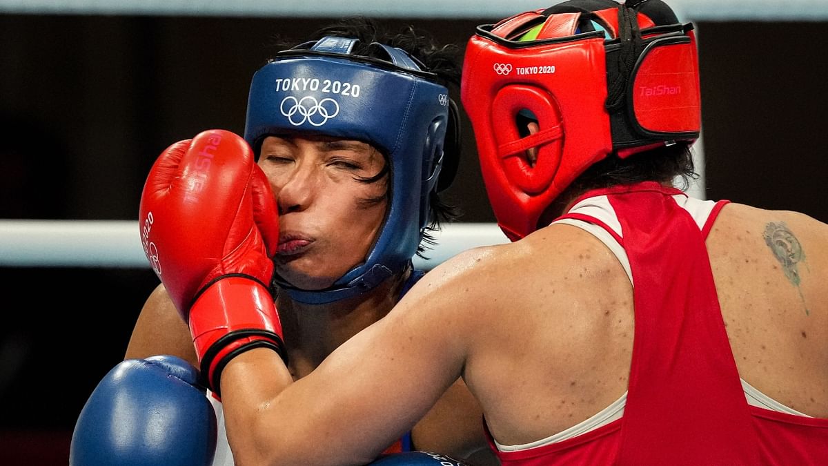 Lovlina Borgohain gets a big punch from Busenaz Surmeneli. Credit: PTI Photo