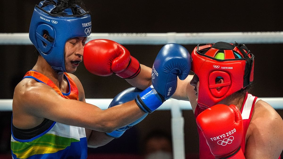 Lovlina Borgohain exchanges punches with Busenaz Surmeneli in the women's welterweight (64-69kg) category boxing semifinal match. Credit: PTI Photo