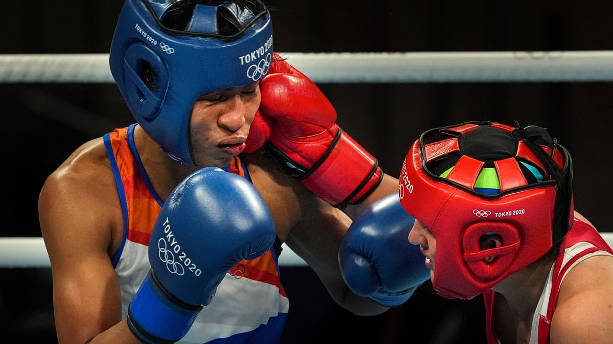 Lovlina Borgohain in action against Busenaz Surmeneli of Turkey in the women's welterweight (64-69kg) category boxing semifinal match. Credit: PTI Photo