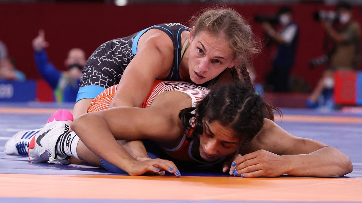 Wrestler Vinesh Phogat suffered a massive upset defeat at the Olympic Games after being pinned by Belarus' Vanesa Kaladzinskaya in the 53kg quarterfinals to not only go out of the gold medal race but also face the risk of getting eliminated. Credit: AFP Photo